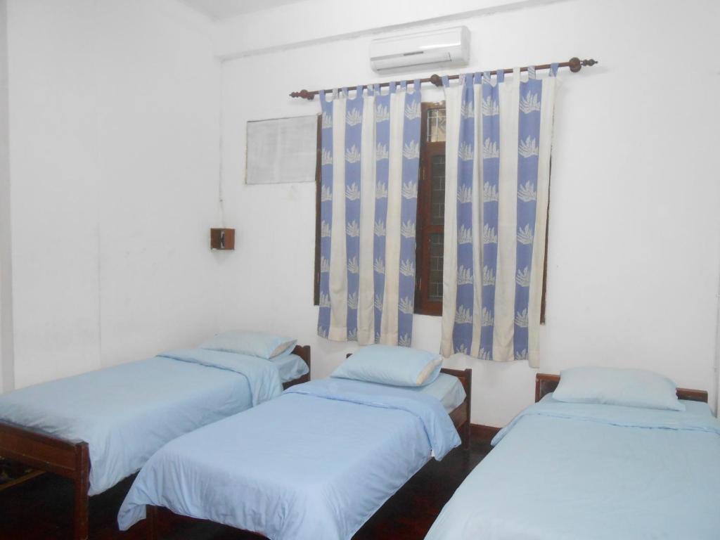 Saysouly Guesthouse Vientiane Værelse billede
